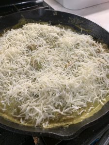 pollo con rajas topped with cheese